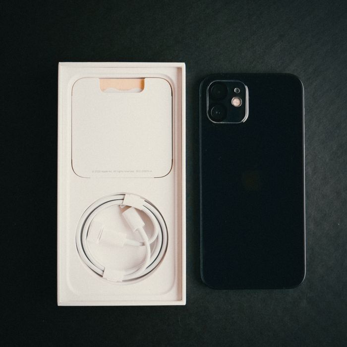 Smartphone with charging cable and charger box