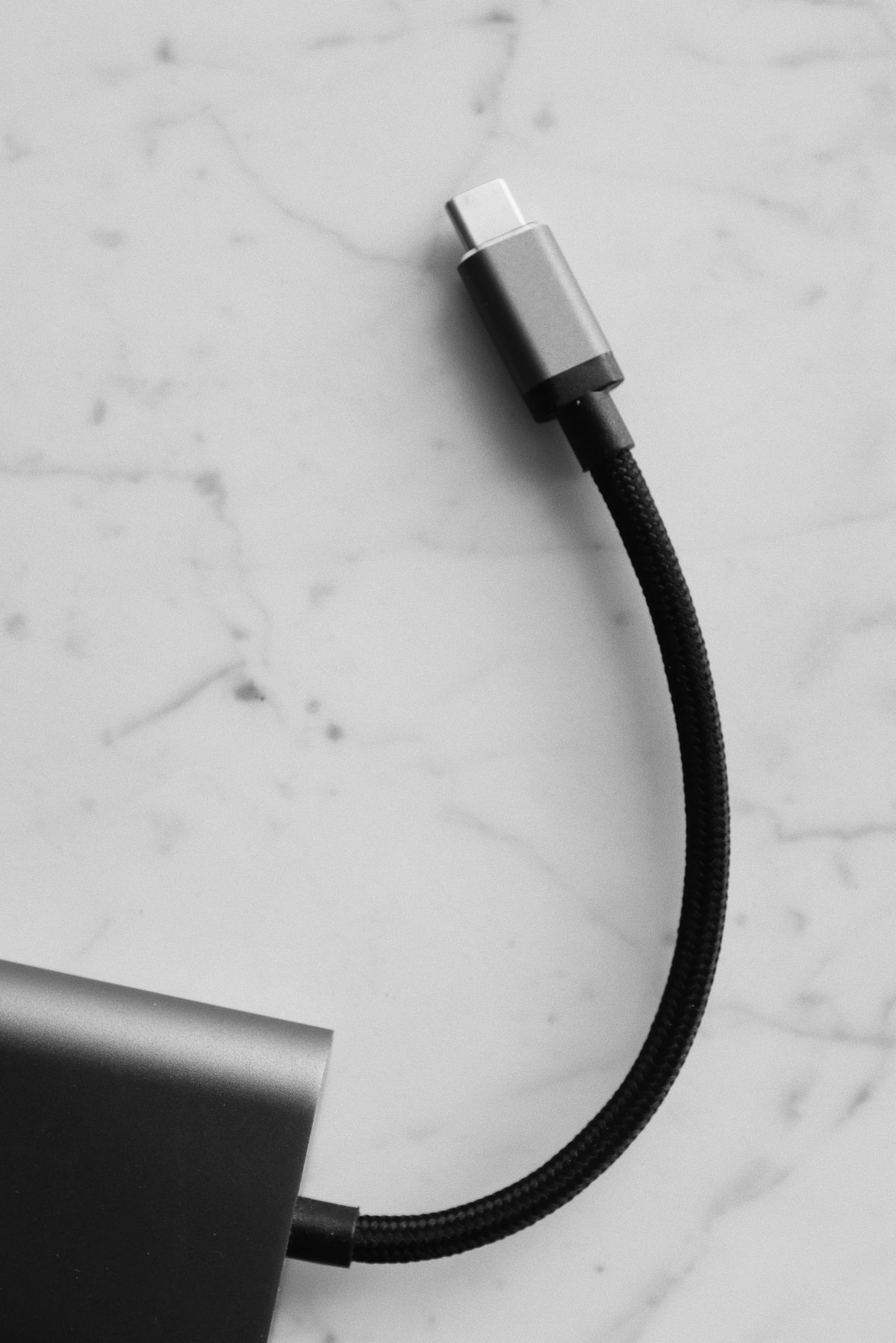 USB-C charging cable on a white surface